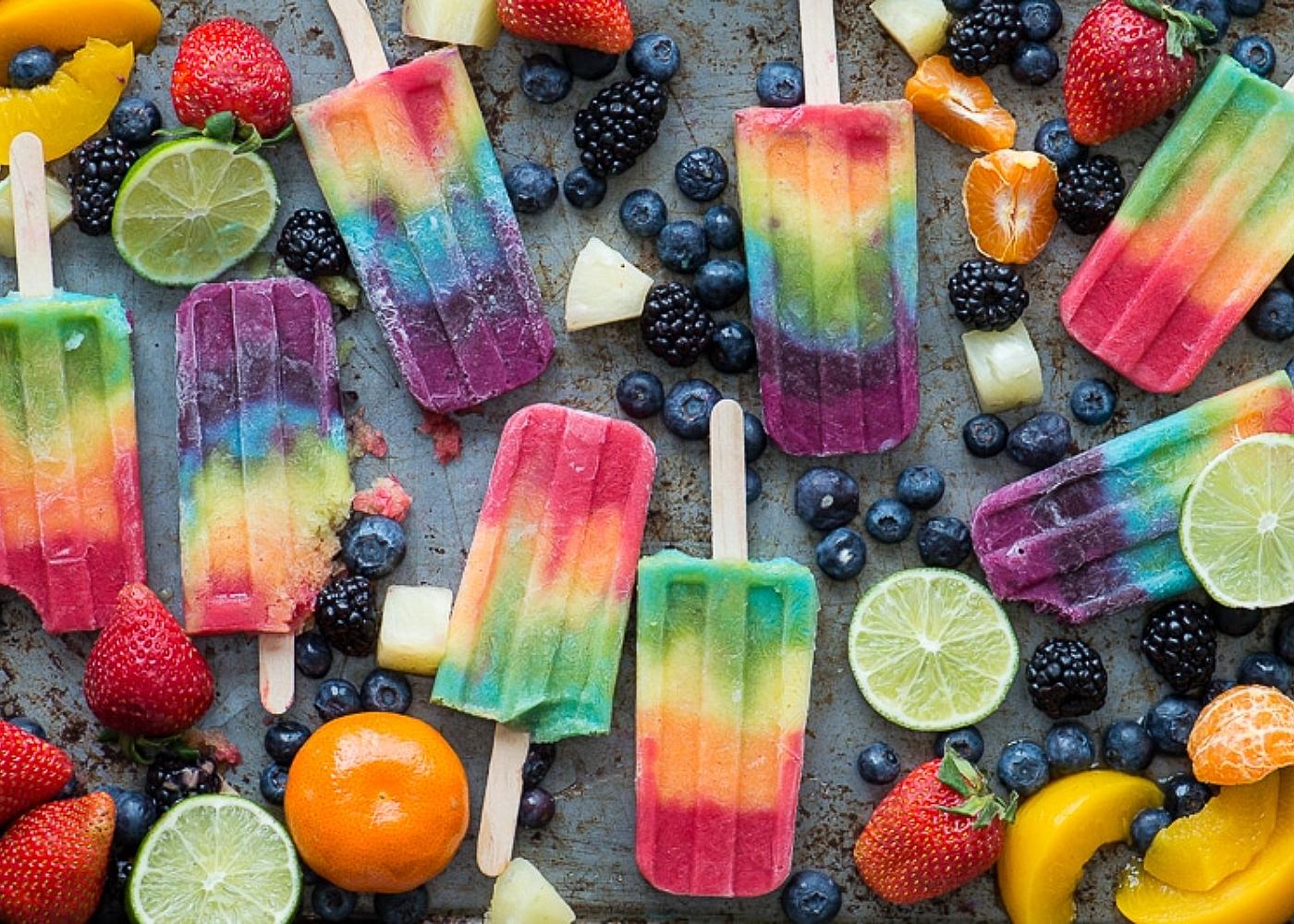 Seven-layer rainbow popsicles by The First Year Blog