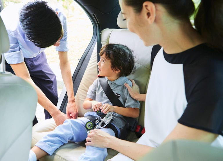 How to travel safely in taxis with kids in Singapore: Safety rules, booster seats and Ride Safer Vests