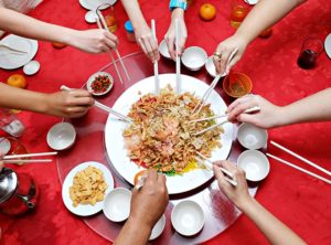 How and why we toss our lo hei at Chinese New Year: a beginner’s guide to yusheng in Singapore