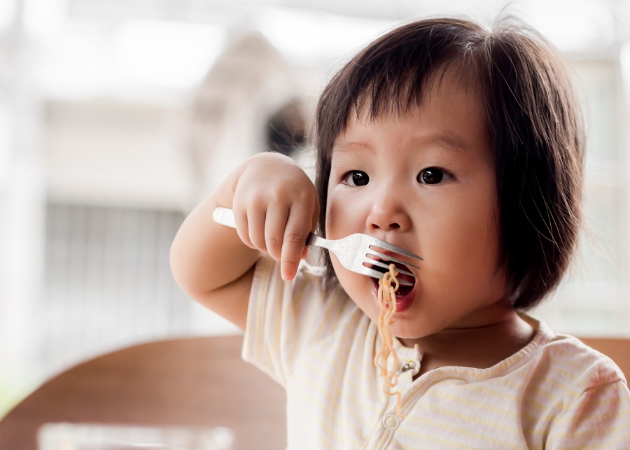 Kid eating food no leftovers no food waste