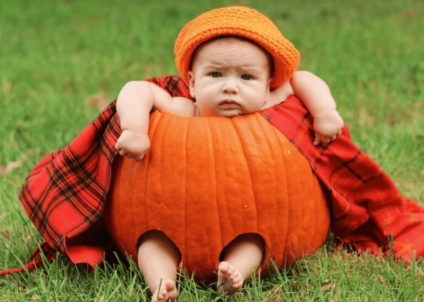 baby in a pumpkin