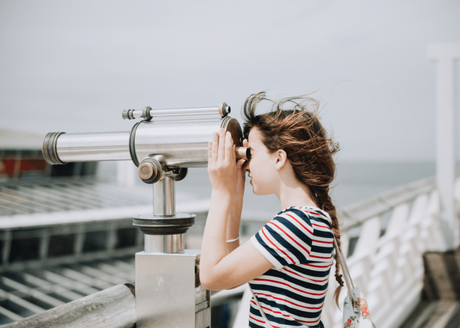 girl telescope teaching kids science