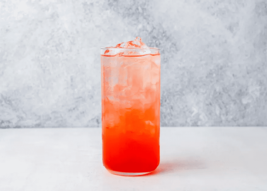 Sparkling peach sunrise by Spruce Eats | Non-alcoholic Christmas drinks